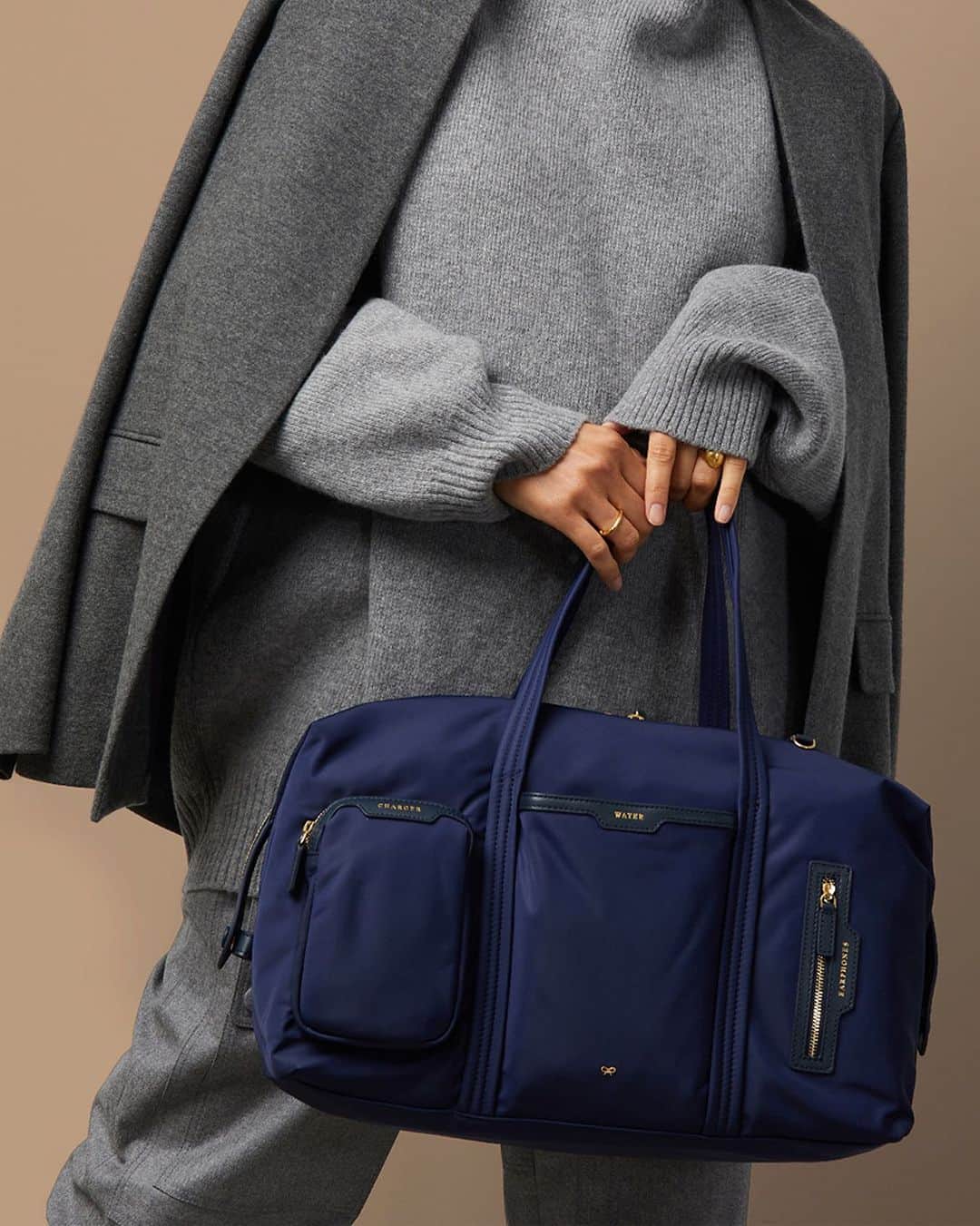 のインスタグラム：「Ready to escape the cold? Our In-Flight Tote will streamline your journey, keeping all your essentials in their place ✈️ #AnyaHindmarch」