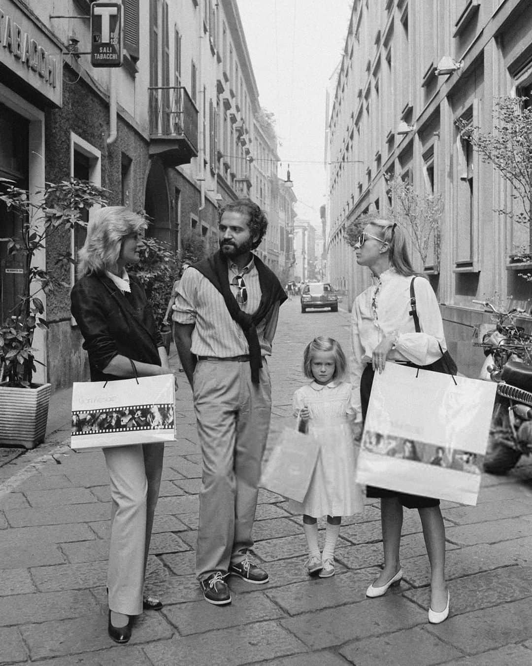 Meganのインスタグラム：「Sunday strolls with Gianni in Milano, 1980 #gianniversace via 〰️ @jetsetclassics」