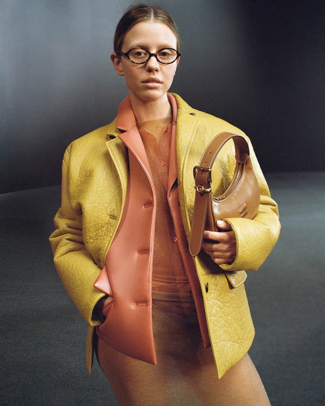 のインスタグラム：「A vintage inspiration meets a contemporary allure in these nappa leather jackets.   Featuring Mia Goth. Photographed by @ZoeGhertner. Creative direction by @EdwardQuarmby. Styled by @LottaVolkova.  #MiuMiuLIVE #MiuMiuFW23」