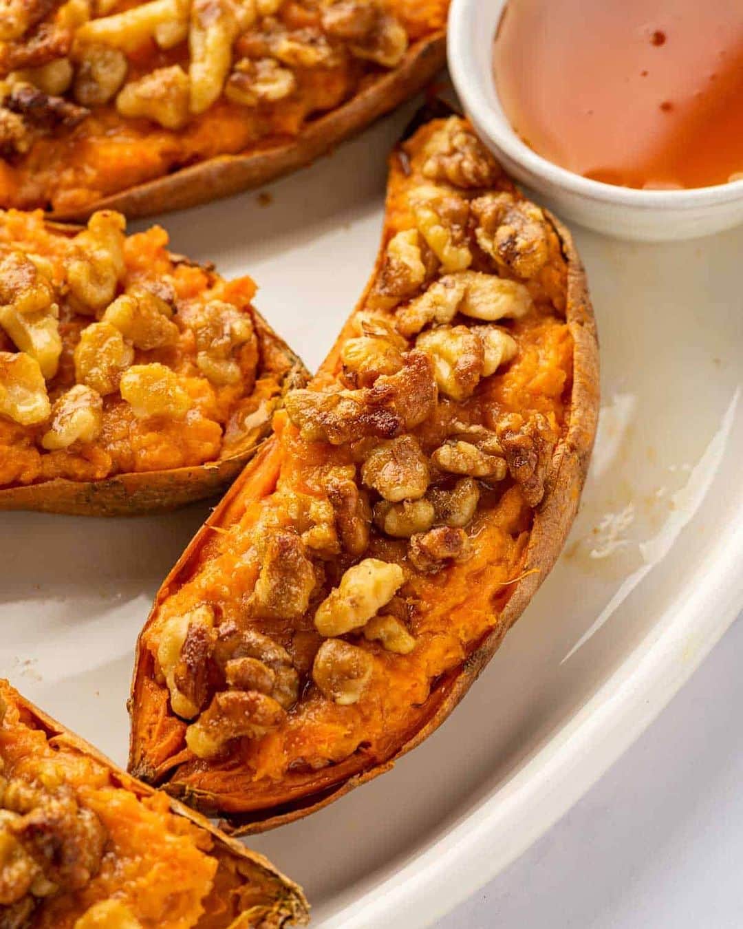 Easy Recipesのインスタグラム：「These Double Baked Sweet Potatoes elevate your normal baked sweet potato recipe and makes the perfect side dish for any holiday dinner or even weeknight dinners during the cold winter months.  Full recipe link in my bio @cookinwithmima  https://www.cookinwithmima.com/maple-walnut-sweet-potatoes/」