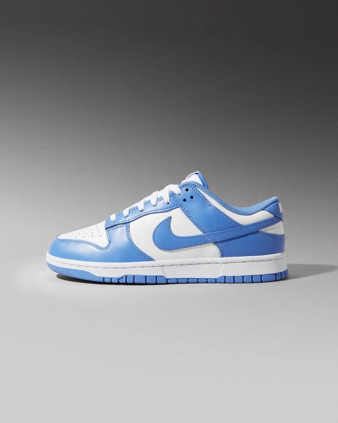 Flight Clubのインスタグラム：「On ice. The Dunk Low 'Polar Blue' emerges in a crisp white leather base with steel blue overlays. Timeless two-tone color blocking and the Nike-branded tongue tag keep this heritage look in peak lifestyle form.」
