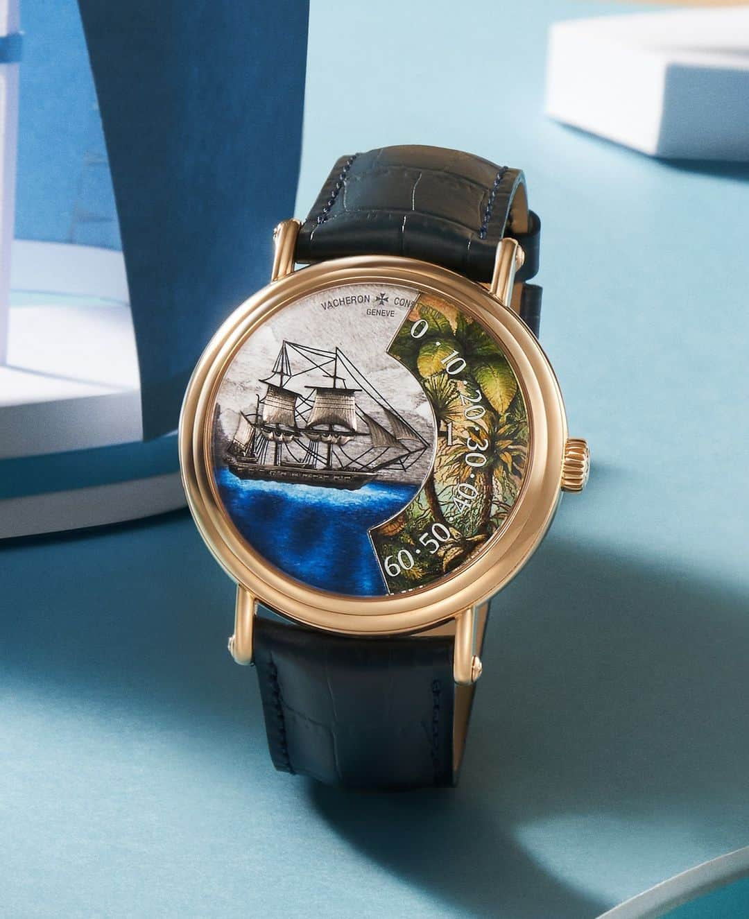 ヴァシュロン コンスタンタンのインスタグラム：「🍃 Meet the Métiers d’Art Tribute to Explorer Naturalists Detroit de Magellan 🚢  At the heart of the 41 mm pink gold case is a two-part tableau.   On the upper part of the dial, engraving and enamelling combine to trace the majestic silhouette of the Beagle. The finely engraved ship with its billowing sails glides across a miniature-painted ocean.   The lower part displaying the hours and minutes is graced with a naturalist scene in which bouquets of flowers burst forth and blossom in the shade of luxuriant foliage, reproduced by the enamelling artisan with infinite finesse and a captivating play on colours, while Calibre 1120 AT/1 reveals its secrets through a sapphire caseback aperture.  Photo courtesy of: @modernweeklystyle  #VacheronConstantin #OneOfNotMany #vacheron #thehourlounge #watches #watch #watchesofinstagram #horology #watchoftheday #instawatch」