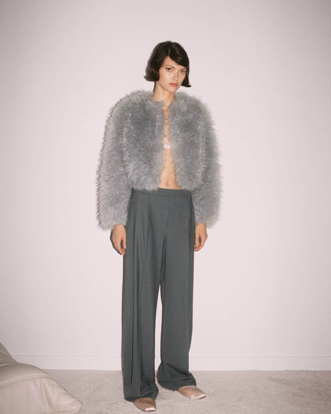 MANGOのインスタグラム：「Delicate knitwear, satin ballerinas and lots of layering 🩰 This week, dance to the rhythm of balletcore, the most viral trend of the year, now at mango.com ⁣ Jacket: 57088273 ⁣ T-shirt: 57027758 ⁣ #MangoWoman」