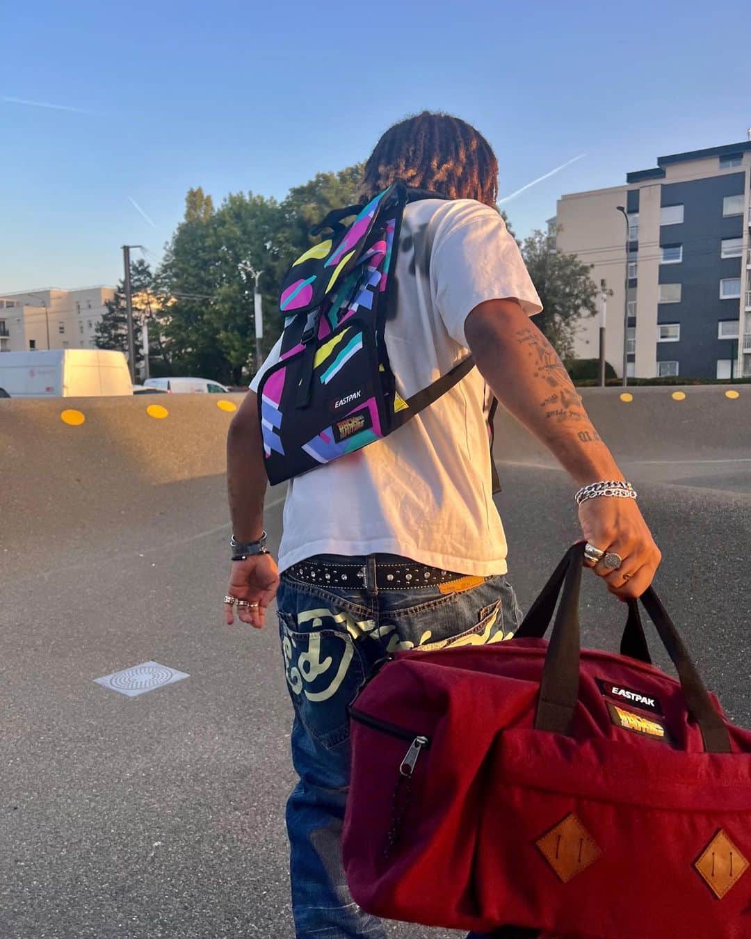 イーストパックのインスタグラム：「The four products in this retro collection feature the Back to the Future Burgundy fabric and the flashy 80s print inspired by the hoverboard.  Tap the link in our bio to shop the collection. #builttoresist #backtothefuturexeastpak」