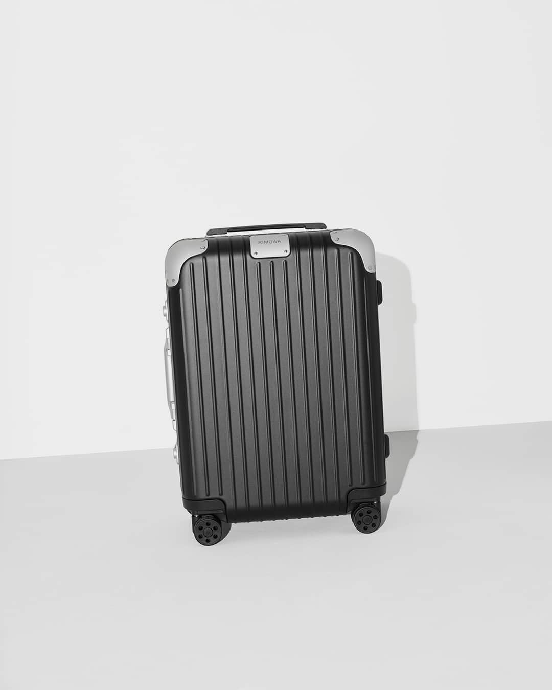 リモワのインスタグラム：「Unlock the future of travel with the new RIMOWA Hybrid Cabin, now in a sleek shade of Matte Black.   #RIMOWA #RIMOWAhybrid」