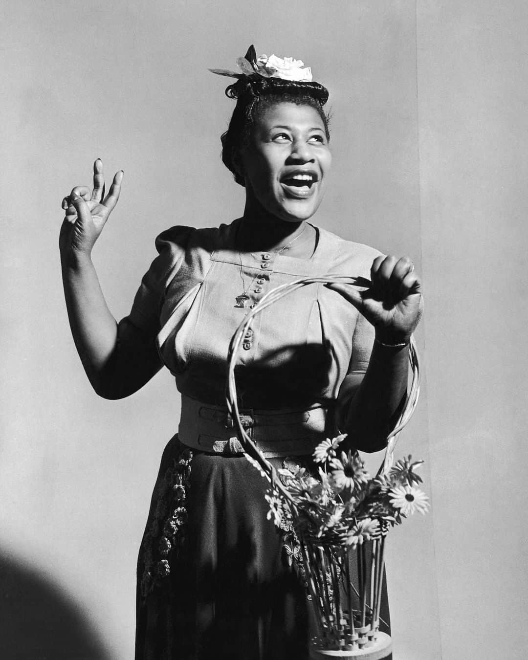 lifeのインスタグラム：「Singer Ella Fitzgerald holding a basket of flowers as she sings 'A-Tisket, A-Tasket' in front of a backdrop, 1946.   (📷 Eliot Elisofon/LIFE Picture Collection)  #LIFEMagazine #LIFEArchive #LIFELegends #EllaFitzgerald #Singer #1940s」