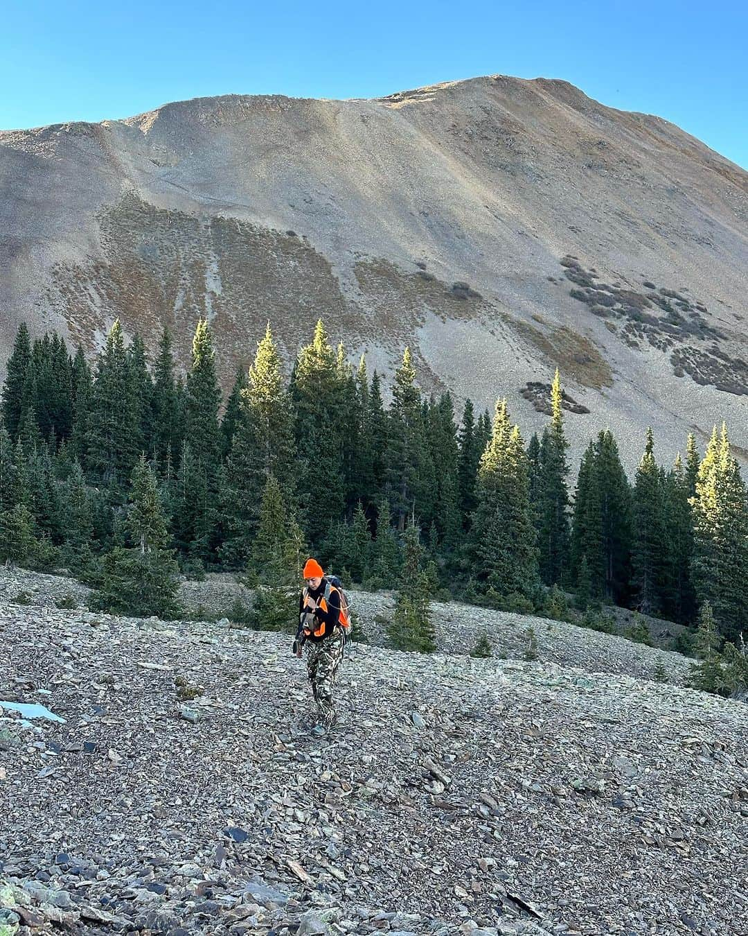 ヴァレンティン・トーマスさんのインスタグラム写真 - (ヴァレンティン・トーマスInstagram)「Part 2. Day 4 brought a turning point in our luck as we finally spotted a herd across a valley. Although we were far from them, Chandler made the right call to observe their behavior and rest for the night. I was eager to pursue them immediately, but we set up camp higher up and kept a watchful eye until darkness fell. ‌ Day 5. As the sun rose, the herd reappeared. "Alright, they're still there. Let's F do this!" Chandler and I drove across the valley, parked at the bottom, and began our ascent. The incline was steeper than anticipated, I often had to bear crawl and clutch patches of grass for stability. I couldn’t even look back, the steepness was unnerving, scaring of losing my footing and tumbling down. I panted heavily, feeling like a worn-out pig 🐖 (oink oink). After climbing uphill about a mile and a half, we settled in a location where the herd had passed twice the previous day. We were confident they would return. They were definitely nearby. The trees were denser than expected, and the clearings were smaller. Our visibility was limited, but we could sense their presence. We could even catch their scent. Thinking they were right past the tree line (spoiler alert, they weren’t) I took off my shoes and left my backpack with water behind. With our narrow field of view, sneaking closer was our only option. We quickly realized that shots over 100 yards simply wouldn’t happen. Off I went on a wild chase, leaving shoes and water behind. The terrain was treacherous, with rocks digging into my bare feet. Still, I couldn't spot any elk. It was 5:30 pm, last tag day, and we were an hour's uphill hike away from our stuff. I cursed my rookie mistake. Lesson learned: no more removing shoes until I have visual confirmation. We decided Chandler would retrieve our gear while I continued downhill, even if it meant trekking in my socks. With an hour before darkness, I descended as swiftly and silently as possible, hoping for a last-minute miracle where I might catch sight of an elk. For most of the next hour, I found myself alone, mostly sliding on my ass, gun strapped to my back, navigating the mountain's steep slope trying not to fall. (Continues in comments).」10月24日 0時15分 - valentinethomas