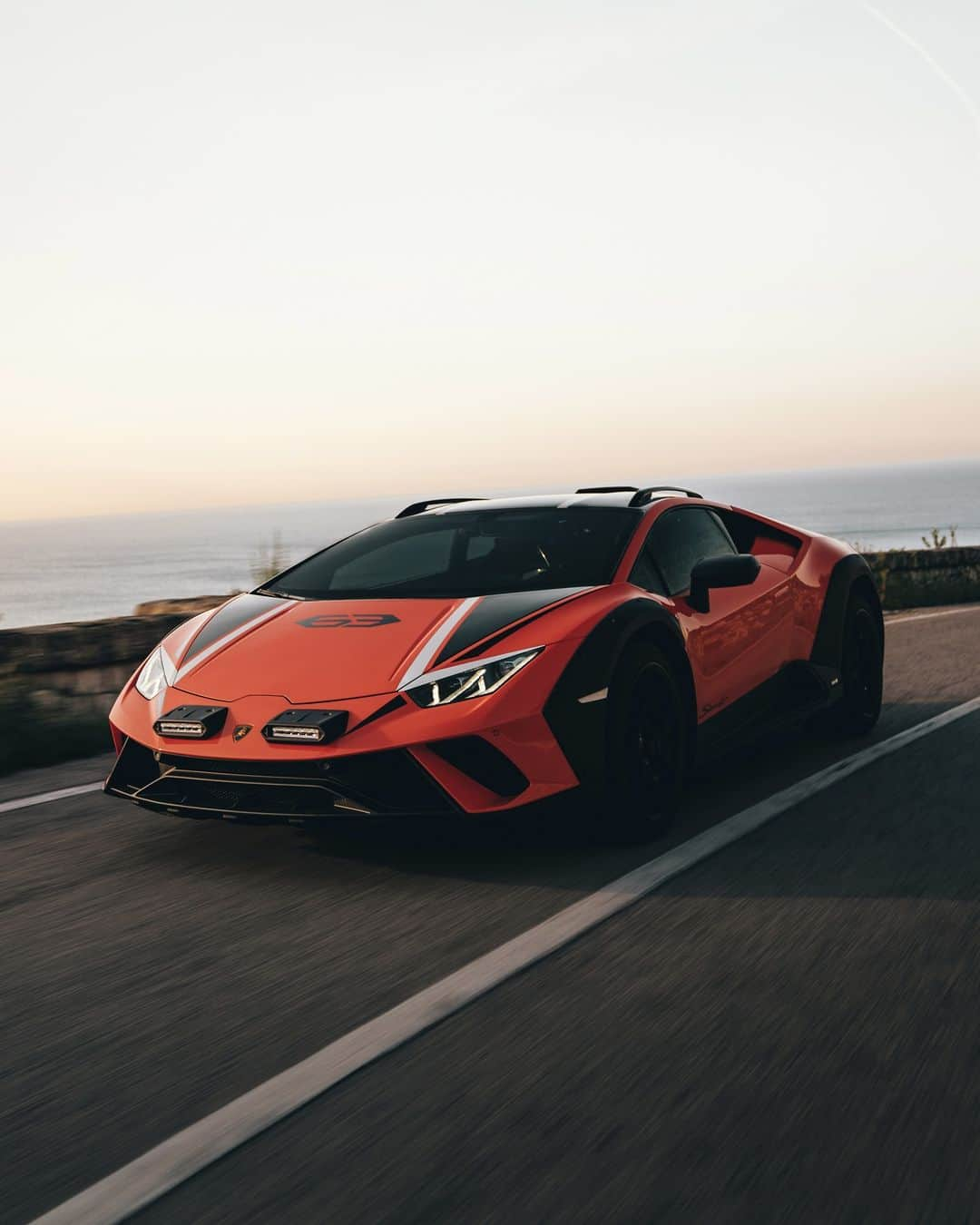 ランボルギーニのインスタグラム：「When asphalt ends, a new type of fun begins. Huracán Sterrato explores another frontier in driving pleasure.  #Lamborghini #HuracanSterrato #BeyondTheConcrete __ Huracán Sterrato: fuel consumption combined: 14,9 l/100km (WLTP); CO2-emissions combined: 337 g/km (WLTP)」