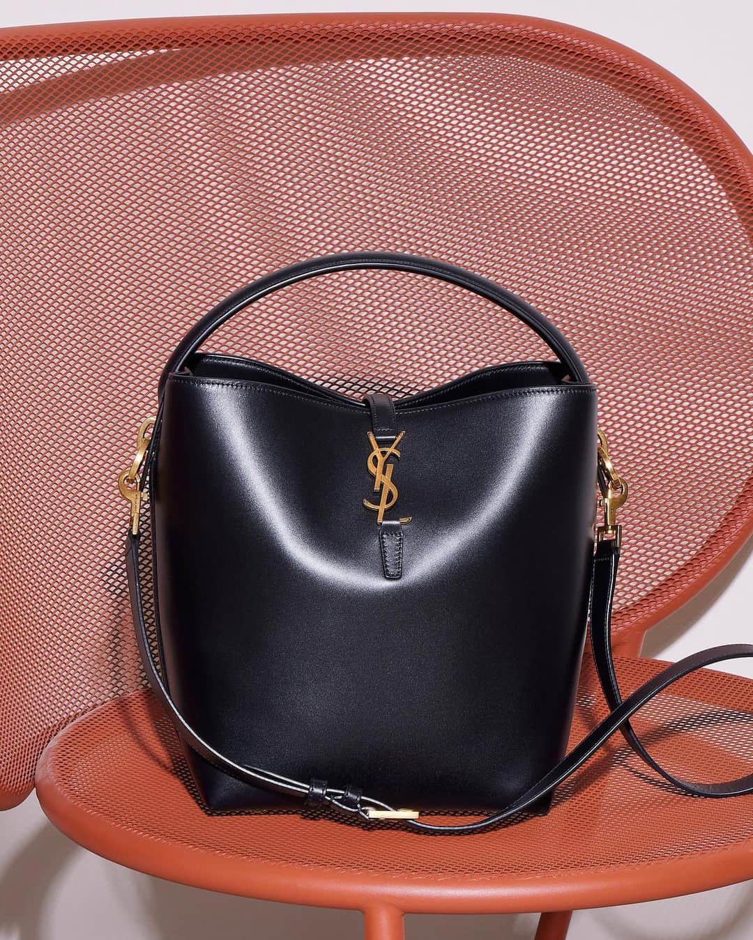 Saks Fifth Avenueのインスタグラム：「Fact: @ysl’s swoon-worthy leather bucket bag deserves its own seat at the table. Tap or head to the link in our bio to shop now. #Saks」