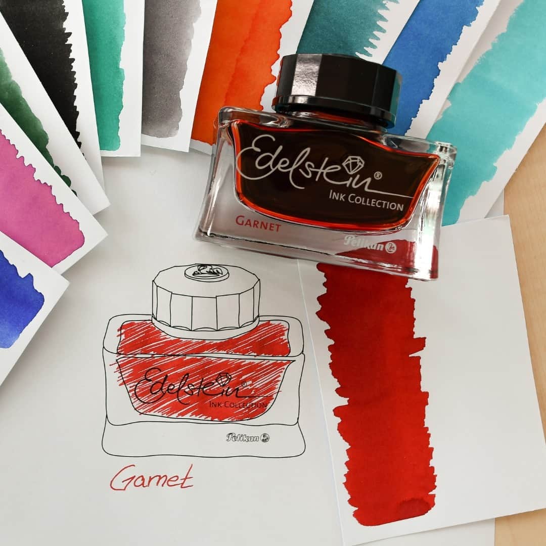 ペリカンのインスタグラム：「"Immersing my pen in the rich allure of Edelstein Ink Garnet!"   This captivating gemstone, with its bright red color, has a history as profound as its color. Symbolizing passion, strength, and eternal love. 💕✨ With each stroke,you can feel the fiery energy of Garnet infusing your writing, igniting the pages with emotions that run as deep as the gemstone's roots.  What do you use our Edelstein Ink Garnet for?  💎 Available as a 50 ml ink bottle.  #PelikanPassion #EdelsteinInk」