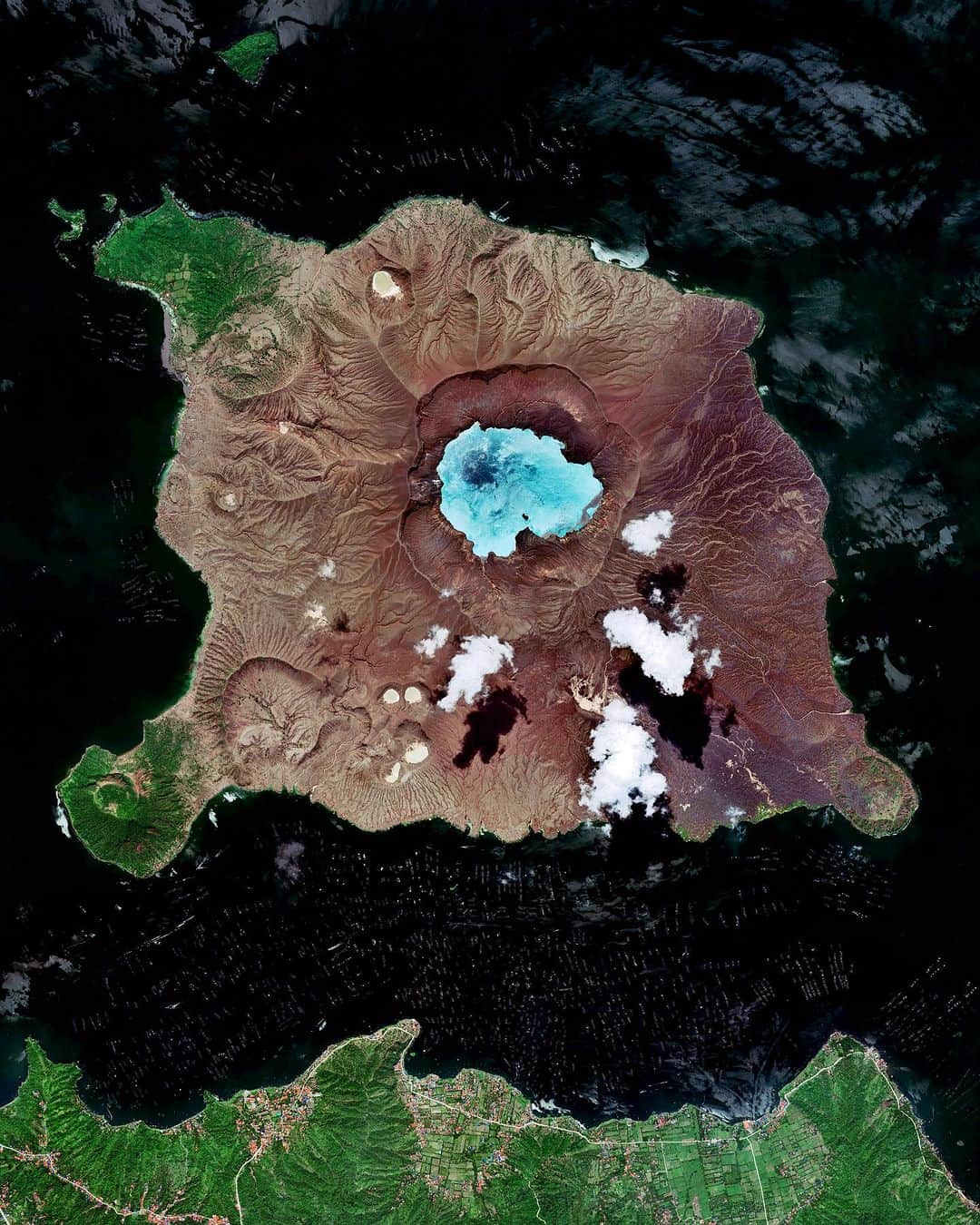 Daily Overviewさんのインスタグラム写真 - (Daily OverviewInstagram)「Taal is an active stratovolcano located on the southwestern end of Luzon Island, Philippines. It has a crater lake at its center, and the entire 8.9-square-mile (23 sq. km) volcanic island lies within a larger caldera, also known as Taal Lake. Even its crater lake contains a small island, Vulcan Point, which is one of few “islands in a lake on an island in a lake on an island” in the world.  Created by @dailyoverview Source imagery: @maxartechnologies」10月25日 0時38分 - dailyoverview