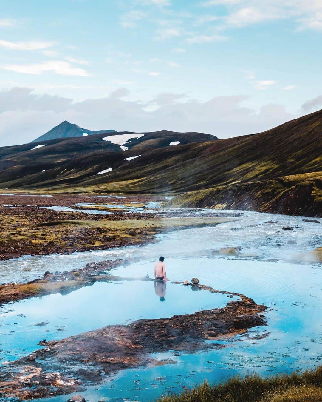 Travel + Leisureさんのインスタグラム写真 - (Travel + LeisureInstagram)「Photo by @gunnargunnar 💧 From erupting volcanoes to powerful geysers, Iceland is teeming with geothermal energy — and few experiences immerse visitors in this natural phenomenon like the country's signature hot springs. Get our list of the seven best hot springs in Iceland at the link in bio.」10月25日 3時15分 - travelandleisure