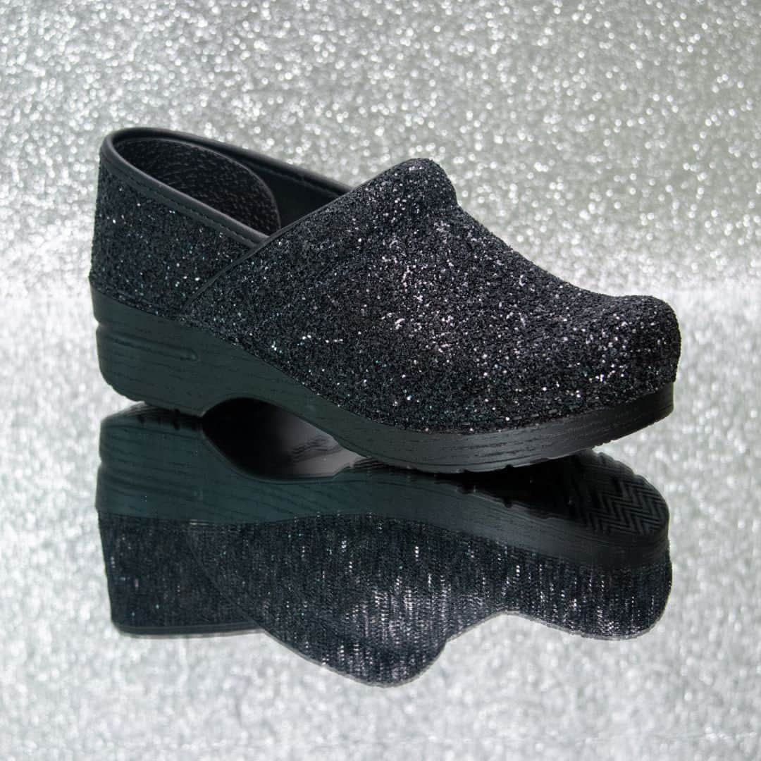 ダンスコのインスタグラム：「All that glitters....doesn't have to be gold - sometimes it can be black 🖤! Shop our new LIMITED EDITION Pro Glitter clogs, link in bio. ✨ ✨ ✨  #glitter #dorothy #witch #danskofootwear #comfort #fashion #ootd #beautiful #happy #cute #travel #smile #joy #life #style #instadaily #friends #family #fun #instagood #gowhereyourehappiest #fallstyle #taylorswift」