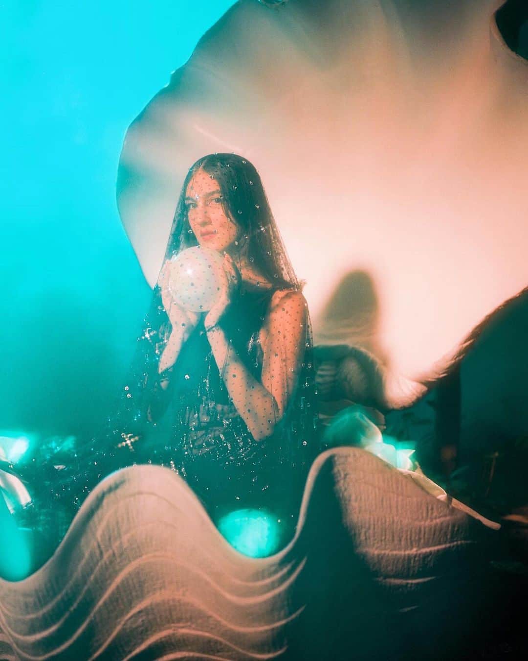 ロダルテのインスタグラム：「@weyesblood wears Rodarte’s FW23 Glitter Tulle Slip and Veil for @schonmagazine.  Photo by: @ambarbecutie, styled by: @lindseyhartman.  Photo and Lighting Assistant: @max_flick, EP: @choxiee, HMU: @leticiallesmin, Set Dresser: @charles_han, Art Assistant: @tarazorthian  #rodarte #weyesblood」