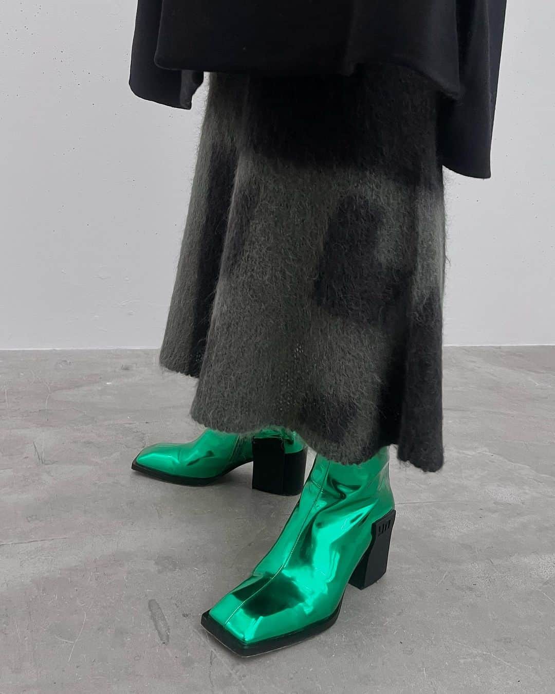 MIDWEST TOKYO WOMENのインスタグラム：「. 【Shoes】 jimmy mid Ⅱ @unitednude_japan malachite,gunmetal / 36-41  【Outer】 wool river coat @enfold_official black,blue / size 36,38  【Tops】 origami dyed suri alpaca wool knitted pullover @mamekurogouchi khaki,white / size 1-3  【Skirt】 origami dyed suri alpaca wool knitted skirt @mamekurogouchi khaki,white / size 1-3  【cap】 wool knit hood @kijimatakayuki black,brown,gray  @midwest_tw staff 160cm  ------------------------------------------  MIDWEST TOKYO 東京都渋谷区神南1-6-1 ☎︎03-5428-3171 ✉︎tokyo_w@midwest.jp  月〜土 12:00〜20:00 日・祝 11:00〜19:00  商品に関してのご質問、その他ございましたら お気軽にコメント、DMください。」