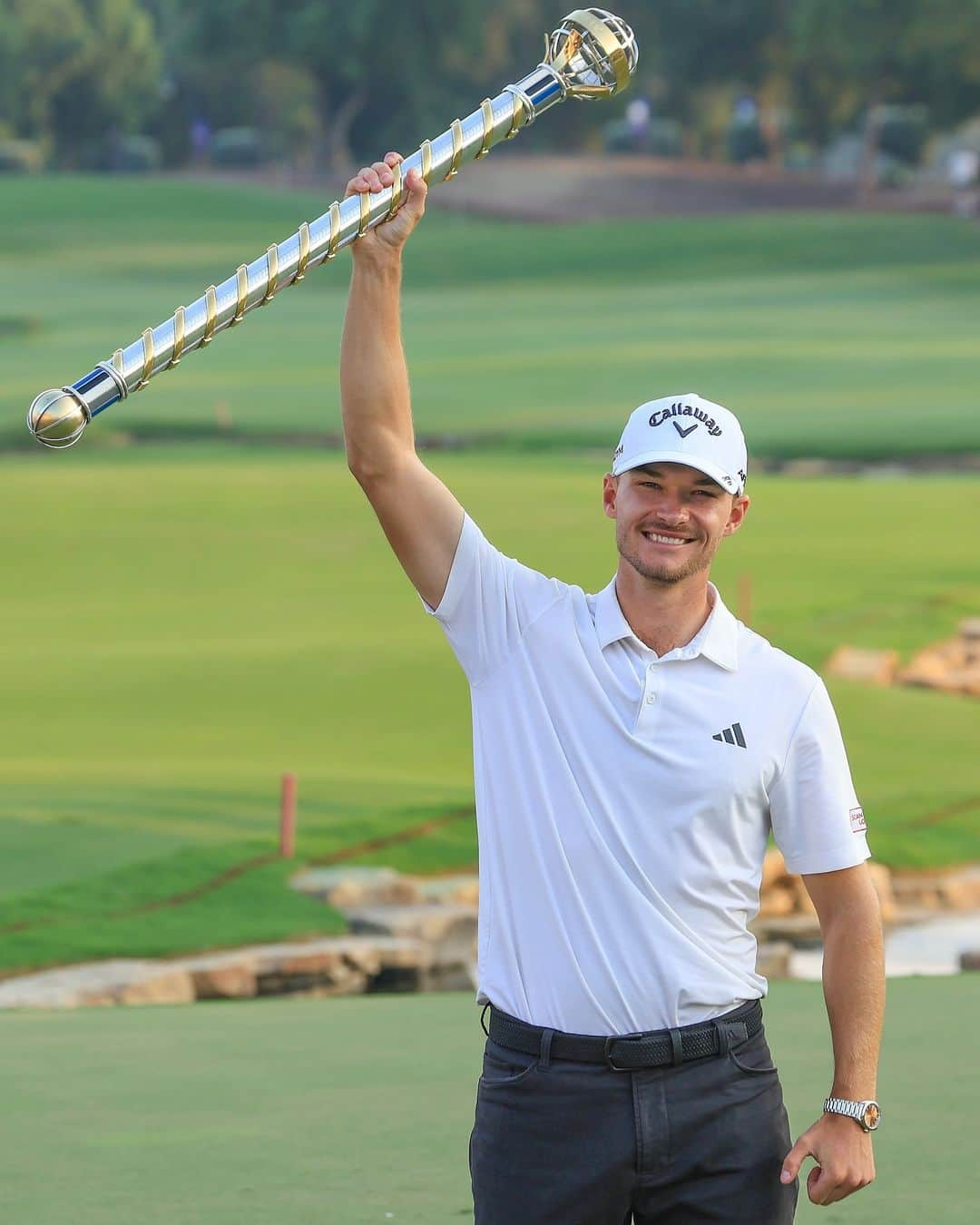 adidas Golfのインスタグラム：「Raise it high, Nicolai 🏆  Nicolai Hoejgaard is the winner of the DP World Tour Championship. Finishing the day with an impressive 8-under 64, Nicolai claimed the biggest title of his career.   Congratulations @nicolaihoejgaard」