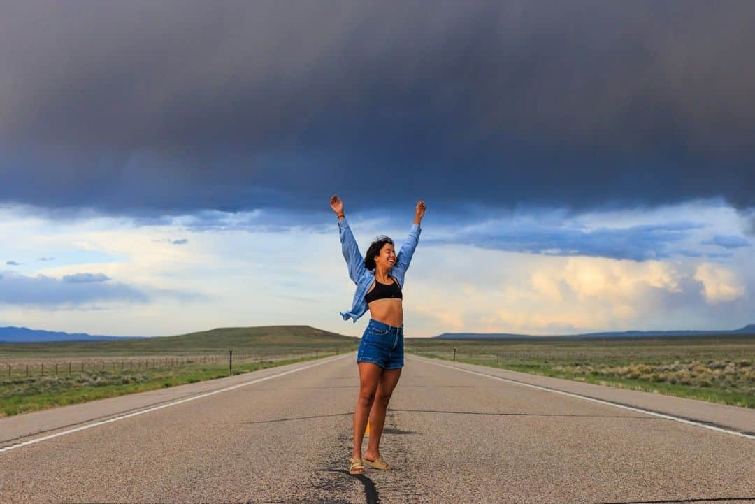 National Geographic Travelさんのインスタグラム写真 - (National Geographic TravelInstagram)「Photo by @sofia_jaramillo5 | My travel companion feels the power of a Wyoming storm on a trip through the southern part of the state. On road trips, I love photographing moments of joy and discovery, from passing storms to quirky small-town attractions. Where is your favorite place to go on a road trip?   For more images of adventure from around the world, follow @sofia_jaramillo5.」11月21日 0時53分 - natgeotravel