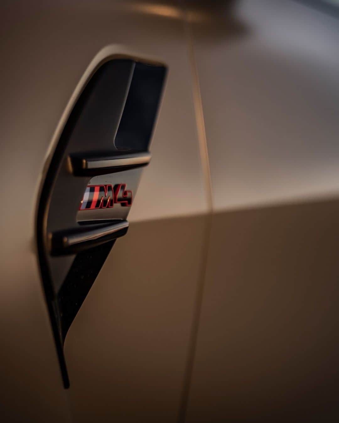 BMWのインスタグラム：「Sunsets couldn't be more thrilling. 🌅 The  BMW M4 CSL. #THEM4 #BMWM #M4 #BMW #MPower  __ BMW M4 CSL Coupé: Combined fuel consumption: 10.1–9.9 l/100 km. Combined CO2 emissions: 227–224 g/km. All data according to WLTP.  Further info: www.bmw.com/disclaimer」