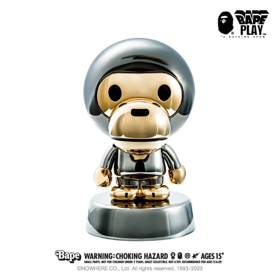 ア ベイシング エイプのインスタグラム：「The BABY MILO® METAL FIGURINE by BAPE PLAY™, limited to 500 editions worldwide, comes with a beautifully crafted box, designed to complement the figurine's aesthetic.   The box is made of premium wood, fireproof panel, aluminum frame and iron handles, adding to the overall quality and durability of the product.   The design of the box features BAPE®'s signature LINE CAMO, adding a touch of elegance and sophistication. The box serves as an excellent display piece with the unique serial number on the top, allowing collectors to showcase their BABY MILO® BY *A BATHING APE® METAL FIGURINE in style.  Pre-orders will be available at BAPE.COM and BAPE STORE® Saturday, November 25th.  #abathingape #bape #bapeplay #babymilo」