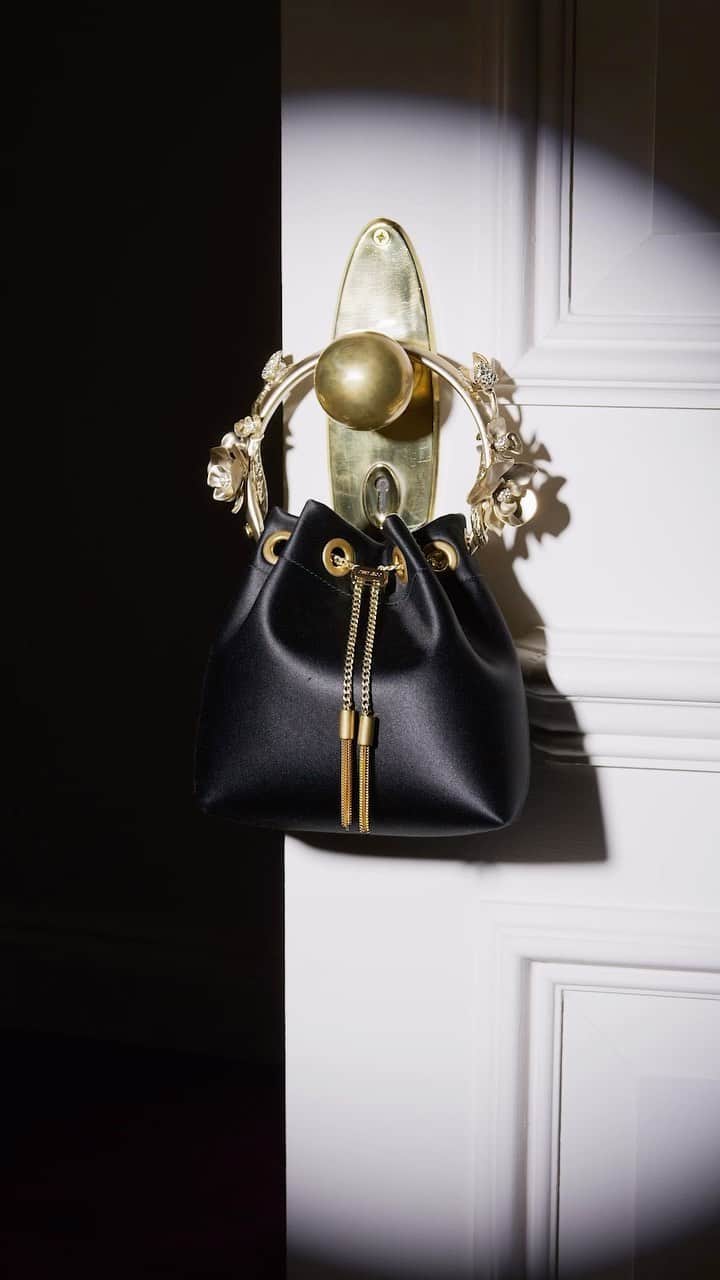 Jimmy Chooのインスタグラム：「Reimagined with sculpted gold orchids for Winter 2023, our aptly named Bon Bon handbag is truly irresistible  #JimmyChoo」