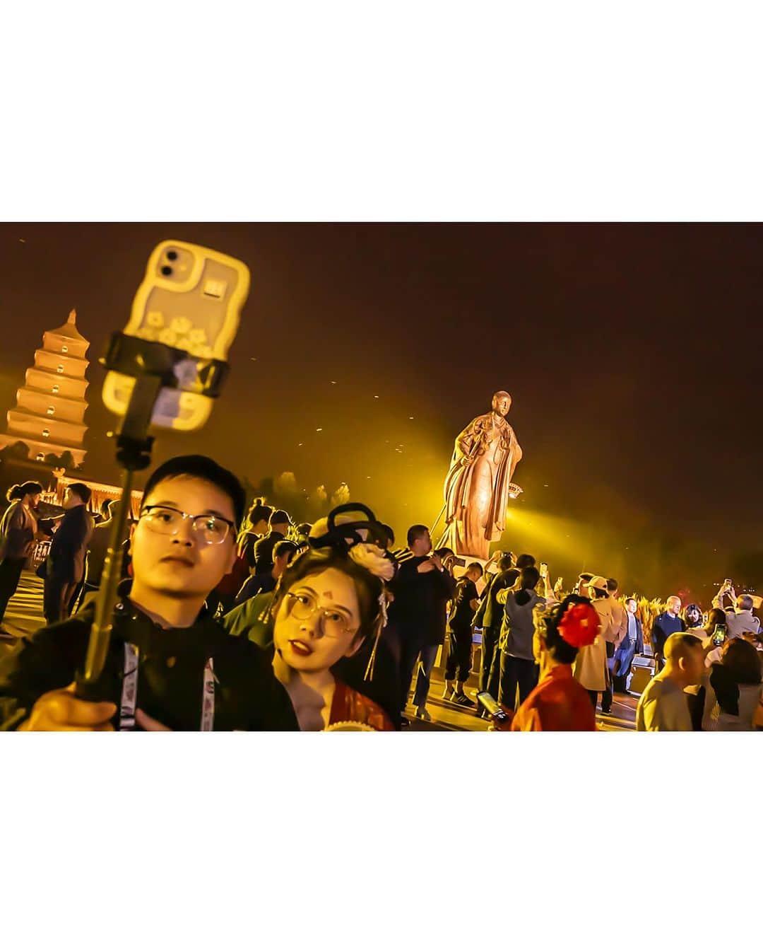 ジョン・スタンメイヤーさんのインスタグラム写真 - (ジョン・スタンメイヤーInstagram)「On assignment earlier this year in China for @NatGeo, some moments aligned naturally. On Chinese Labor Day in May, I was wandering around Xi'an in Shaanxi Province at night by the bronze statue of Master Xuanzang. Tourists were taking selfies, though I was more interested in the beautiful insects swarming the inky yellow light. Xuanzang was a 7th-century Buddhist monk, scholar, traveler, and translator who spent 16 years on pilgrimage to India in 629–645 CE, translating dozens of manuscripts. He is the spiritual master known for his contributions to Chinese Buddhism. This photograph is from a much broader essay for chapter ten of the @OutOfEdenWalk, publishing in National Geographic magazine in September 2024. In thankfulness, it was selected for this year's NatGeo Pictures of the Year in the magazine's December issue and is available today on newsstands or in your postbox. Thank you, @sadiequarrier, for including Xuanzang, the Giant Wild Goose Pagoda behind the master, and flying insects in the magazine, with many other powerful images by my NatGeo colleagues and friends. ⠀⠀⠀⠀⠀⠀⠀⠀ @InsideNatGeo @NatGeo #china #XiAn #shaanxi #Xuanzang #insects #GiantWildGoosePagoda #OutOfEdenWalk #NatGeoPOY23」11月21日 2時22分 - johnstanmeyer