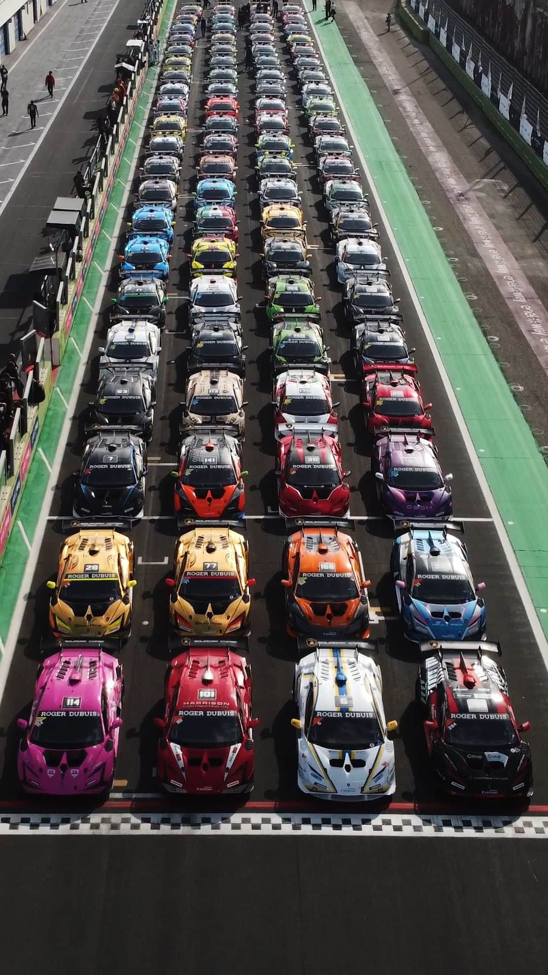 ランボルギーニのインスタグラム：「Ten years of @lamborghinisc have quickly passed.  So we celebrated the decade the only way we know how, by going fast.   Spectators during the weekend had the opportunity to enjoy a multitude of rousing events at the Vallelunga circuit and to live the thrill of the World Finals, which marked the end of the 2023 Super Trofeo Europa, Asia, and North America season and set records for both the number of cars registered and the attendance (10,000 people). And it did not stop here: they also witnessed the victory of Amaury Bonduel, Frederik Schandorff, Alex Au, Glenn McGee and Antony McIntosh each one of them with raised glasses of @champagnecarbon on the podium.」