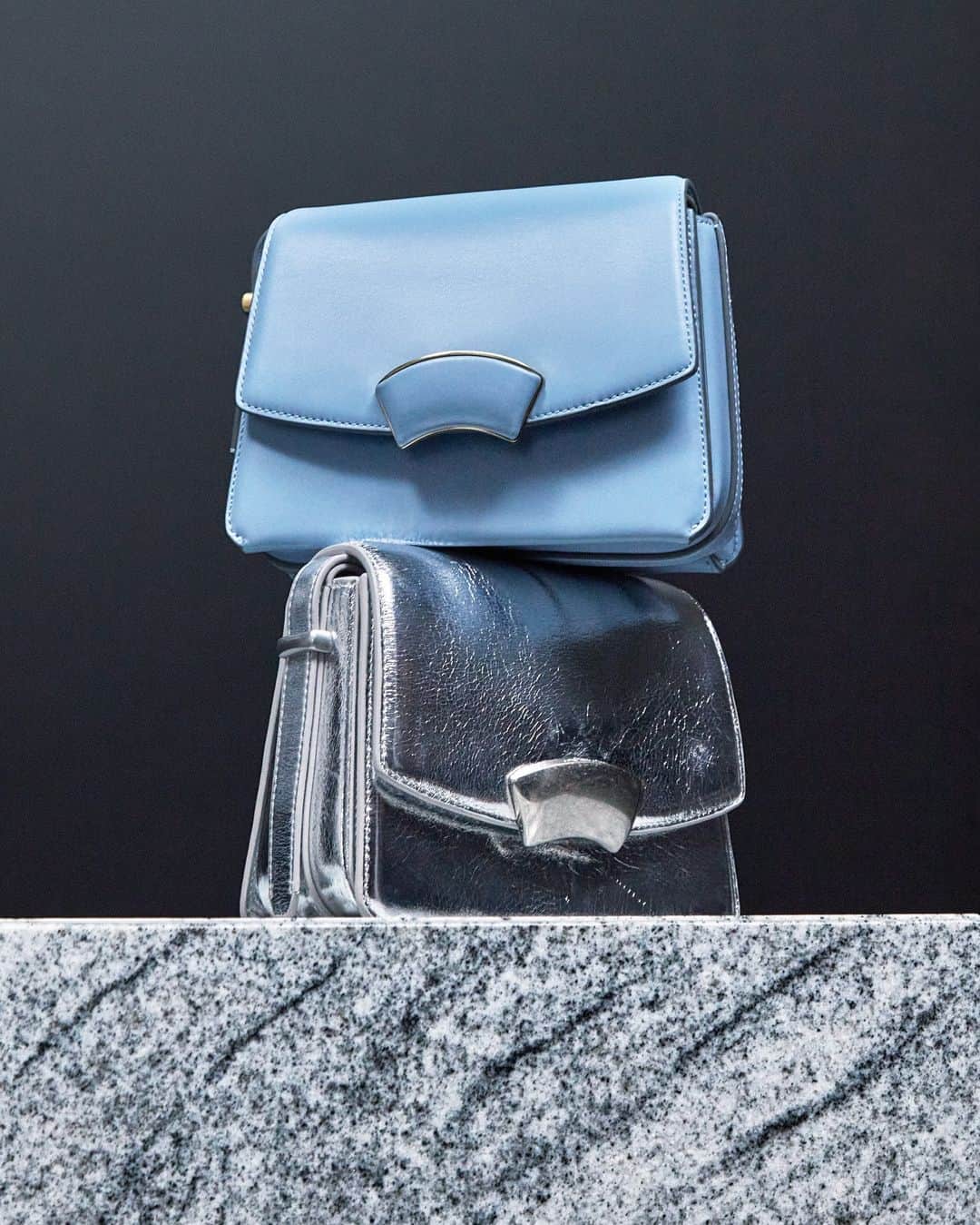 3.1フィリップリムのインスタグラム：「DID YOU GET ID’ED?  Meet the ID Shoulder bag - a sophisticated new iteration of our ID series. It features a structured silhouette crafted from shiny, smooth nappa leather, punctuated with hardware inspired by chunky ID bracelets.」