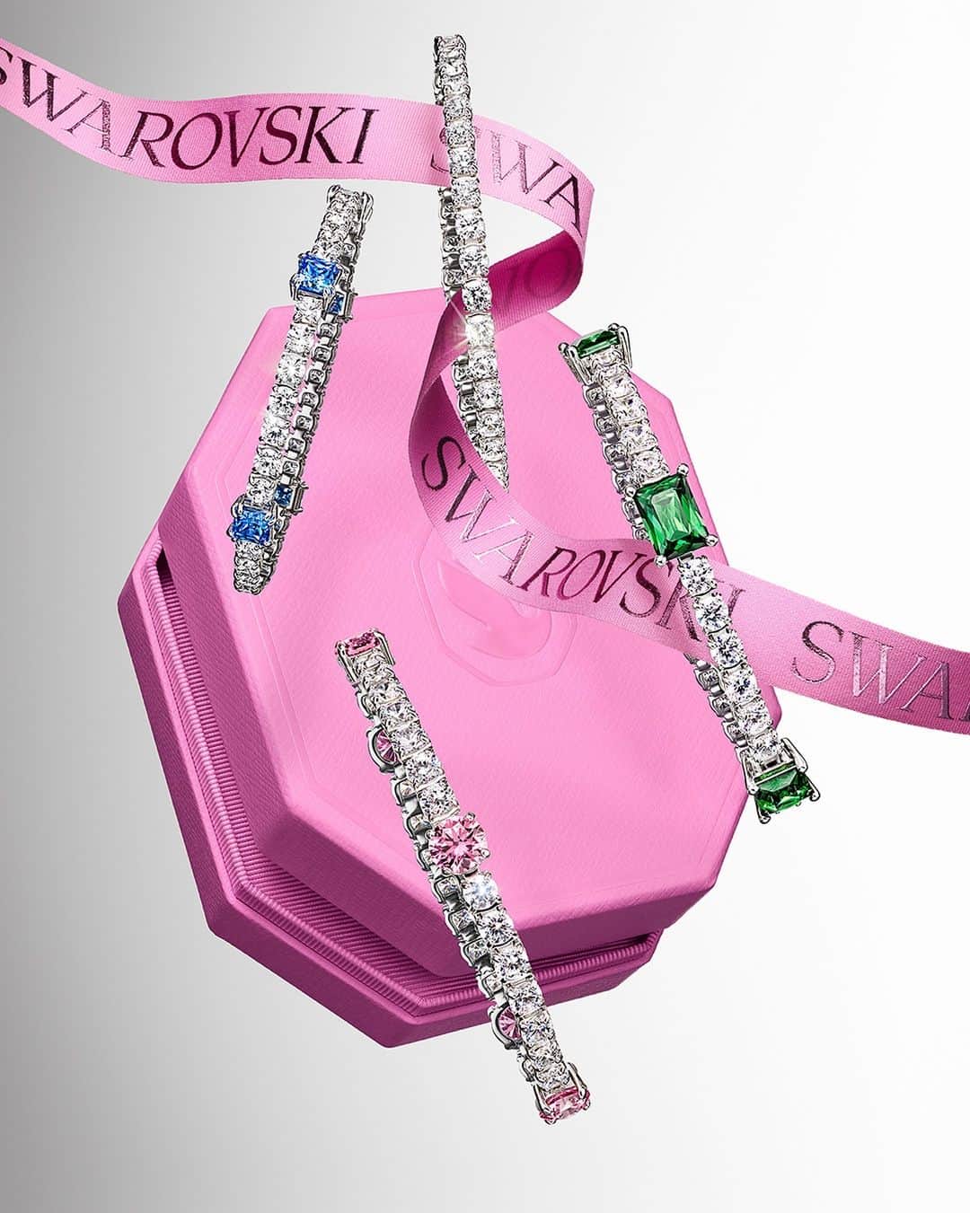 SWAROVSKIのインスタグラム：「Give luxury with the supremely stackable #SwarovskiMatrix bracelets this Holiday season. With celebratory pops of green, blue, and pink crystals in each shimmering white stack, they‘re the perfect way to Celebrate Wonder.   #Swarovski #CelebrateWonder #CrystalMetamorphosis​​」