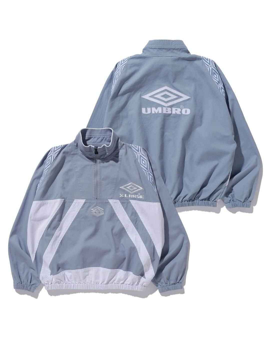 エクストララージさんのインスタグラム写真 - (エクストララージInstagram)「11.25.sat XLARGE×UMBRO  イギリス発のフットボール用品ブランド「UMBRO(アンブロ)」。 1990年代初頭より、ユニフォームを強豪クラブチームや各国代表チームに提供し続けていたことから、世界のフットボールファンやスポーツシーンにおいて根強い人気誇り、ブリットポップムーブメント全盛期にはイギリス人アーティストが私服や衣装に取り入れたことで話題になり、UKファッションシーンにも大きなインパクトを与え続けてきた。  XLARGEとUMBROは、今回初となるタッグを組み、カプセルコレクションを発表する。 UMBROのダブルダイヤモンドロゴや、今回のためにデザインされた両ブランドのロゴを組み合わせたロゴを刺繍で落とし込んだパファージャケット、ハーフジップジャケット、ドリルトップのセットアップ、イヤーフラップ付きポンポンビーニーがラインナップ。 日本国内のXLARGE、XLARGE/X-girl全店舗(※一部店舗除く)と、オンラインストア「calif」「ZOZOTOWN」にて、11月25日(土)12:00より発売。  - XLARGE×UMBRO HALF ZIP PULLOVER JACKET - XLARGE×UMBRO PUFFER JACKET - XLARGE×UMBRO DRILL TOP - XLARGE×UMBRO DRILL PANTS - XLARGE×UMBRO EAR FLAP BEANIE  UMBRO 1924年、イングランドのマンチェスターで誕生したフットボールブランド。 設立からわずか４年で5000チームに製品を供給できるほどの生産力と顧客の需要に対応するために注文を受けてから48時間以内に配送する前代未聞のサービスを開始し、会社の急成長を遂げた。 1934年には、FAカップ決勝戦でマンチェスター・シティとポーツマスの両チームにユニフォームを提供したことで、アンブロの存在がイングランド中で広く知れ渡った。  詳細は、プロフィールリンクをクリック。 #xlarge #xlargejp #エクストララージ #umbro #アンブロ」11月21日 20時00分 - xlargejp