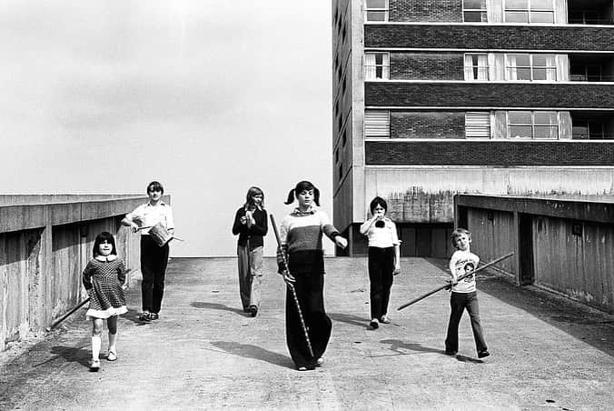 Dazed Magazineさんのインスタグラム写真 - (Dazed MagazineInstagram)「“I can’t imagine our lives without photography or politics!” photographer Tish Murtha’s daughter Ella Murtha tells Dazed about growing up with the late photograher. “My mam lived and breathed photography, the camera was an extension of her.”  Growing up in Elswick in the West End of Newcastle, Murtha had understood the power a camera could wield long before she was privy to the instrument’s mechanics: in her early teens she found a camera in one of the derelict houses she and her siblings would often explore.   An advocate for her community in an era before discourse around ethics and ownership in relation to class and documentarians had become mainstream, Murtha remained undeterred by injustices she saw in the industry throughout her lifetime, separating from Side Gallery when she perceived their principles to be unaligned with her own, and inviting local critics to engage in a discussion after an exhibition of her photographs of juvenile jazz bands led her to become known as the ‘Demon Snapper’.   Her work has since been acquired by Tate, while in March a Newcastle housing development opened in her name, the moniker selected by kids from a local primary school.  Read more through the link in our bio 🔗  📷 @tishmurtha  1. Glenn on the wall, Elswick Kids (1978) Tish Murtha (c) Ella Murtha, all rights reserved 2. Karen On Overturned Chair, Youth Unemployment (1981) - Tish Murtha (c) Ella Murtha, all rights reserved 3. Kenilworth Road Kids, Cruddas Park, Juvenile Jazz Bands (1979) - Tish Murtha (c) Ella Murtha, all rights reserved. 4. Kids Jumping On To Mattresses - Youth Unemployment (1981) Tish Murtha (c) Ella Murtha, all rights reserved. 5. SuperMac, Elswick Kids (1978) - Tish Murtha (c) Ella Murtha, all rights reserved.  ✍️ @zoemaywhitfield」11月21日 21時49分 - dazed