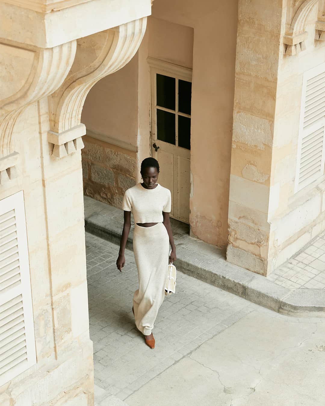 アルチュザラのインスタグラム：「The ‘Mima’ dress is knitted from cashmere to a slim-fitting, floor-skimming silhouette. It’s defined by a cut-out detail and ribbed-knit edges and is finished with a round neck and short sleeves.  www.altuzarra.com #AltuzarraSS24」