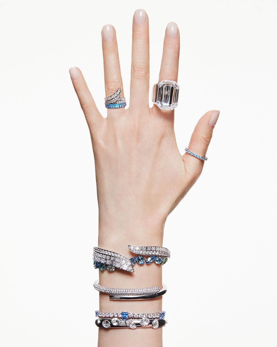 のインスタグラム：「Channel your Holiday snow queen with stacked ice cool blues and glacial white crystals, the ideal way to Celebrate Wonder.  #Swarovski #CelebrateWonder #CrystalMetamorphosis​​」