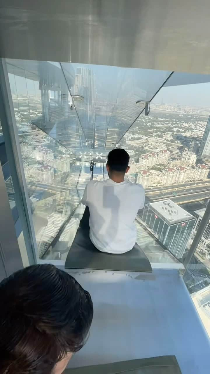 Earth Picsのインスタグラム：「@aljar.ahmed tried the Sky View glass slide in Dubai! Would you slide down this slide?」