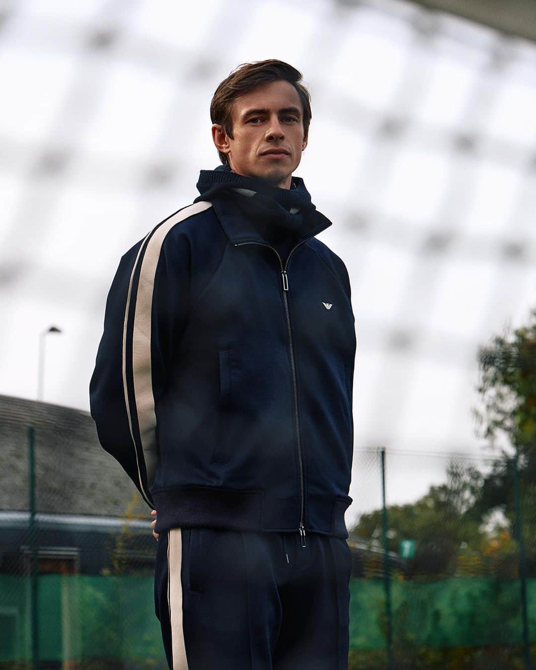 Armani Officialのインスタグラム：「A rendez vous with British actor Ben Radcliffe.  Nineties vibes off the court.   @ben_radcliffe」