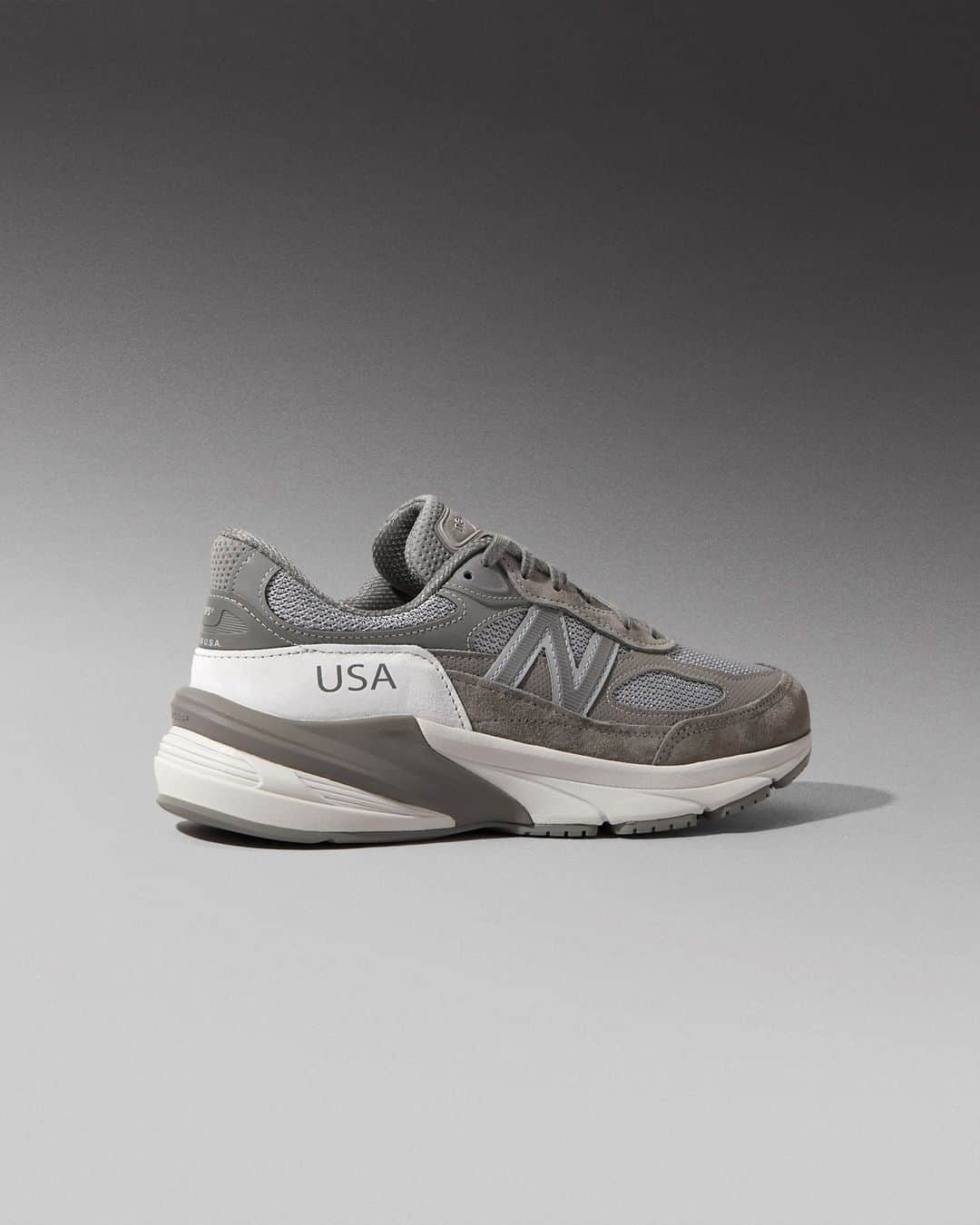 Flight Clubのインスタグラム：「Japan and USA connect on the WTAPS x 990v6 'Moon Mist.' A stealthy blend of greyscale mesh and suede enshrouds the lightweight runner. 'Made in USA' hits appear in oversized letters. The global collab is signed-off with minimal WTAPS branding positioned neatly on the back heel.」