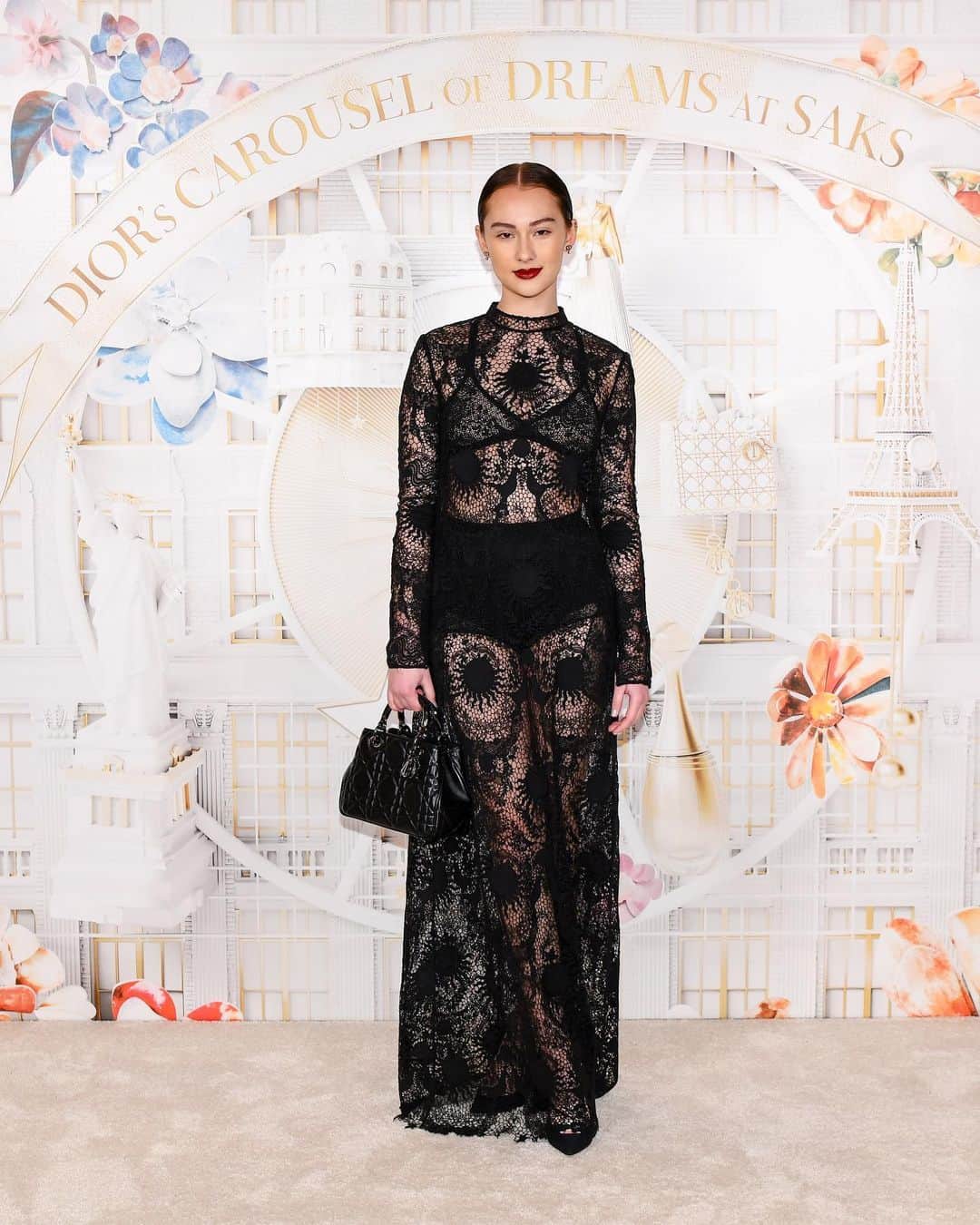 のインスタグラム：「At Dior’s Carousel of Dreams launch at @Saks, the duo of @Lola.Tung in a #DiorSS2024 lace dress and @LeynaBloom in a pristine white silhouette captivated onlookers, dressed in designs by @MariaGraziaChiuri, each exuding individual style and grace.  #SaksxDior」