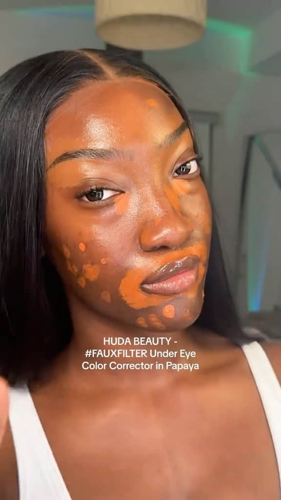 Huda Kattanのインスタグラム：「If @aminaplease says “Go and grab the color corrector,” best believe we’re listening. 🫡  🧡 She uses #FauxFilter Color Corrector in shade Papaya」