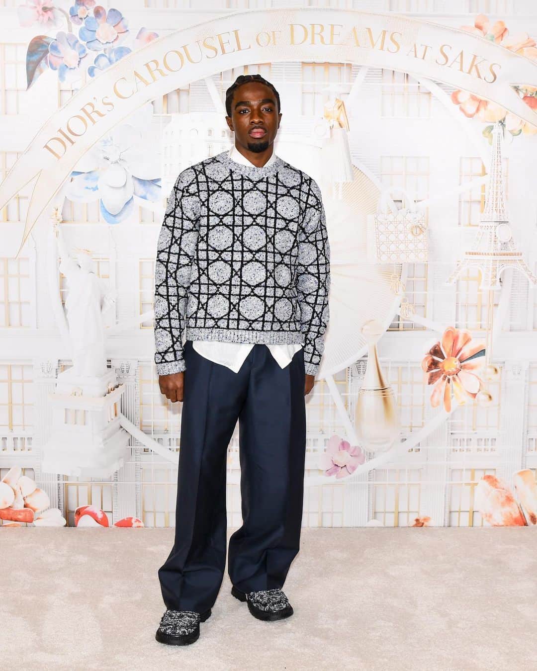 のインスタグラム：「Actors @TheRealCalebMcLaughlin and @EliBrown brought their style to the forefront at the opening of Dior’s Carousel of Dreams at @Saks, fully clad in tailored designs by @MrKimJones.  #SaksxDior」