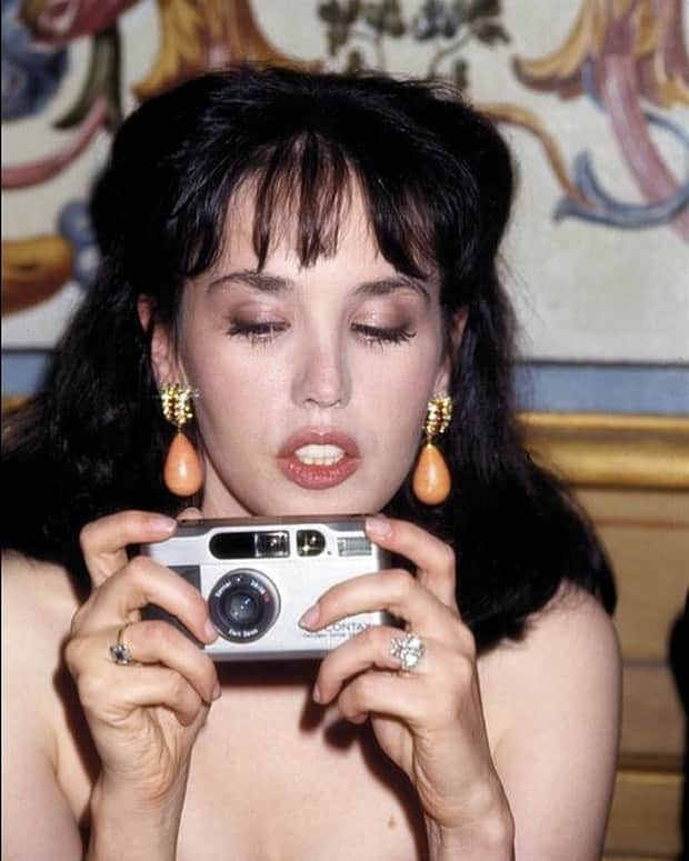 Meganのインスタグラム：「Isabelle Adjani at a soirée for Christian Dior, 1991. 📸 @vanityfair  . . . . #isabelleadjani #vanityfair #camera #styleicon #frenchactress #earrings #christiandior #contax」