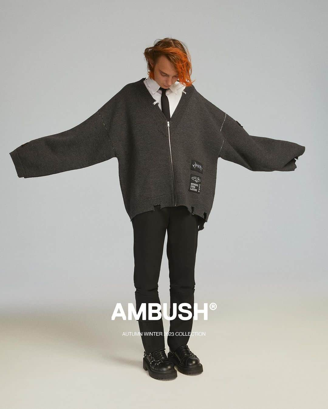 AMBUSHのインスタグラム：「The new chapter of AMBUSH® gives a dark undercurrent to uniform designs.   #AMBUSH AW23 COLLECTION LOOK 4  FELTED KNIT ZIP CARDIGAN CROPPED OVER SHIRT DOUBLE BELTED TROUSERS TAILORING SLIM NECKTIE SID LOAFER  Now available at our WEBSHOP and WORKSHOP」