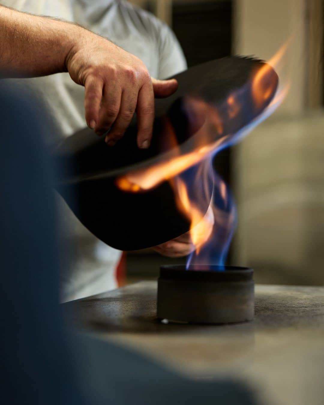 ボルサリーノのインスタグラム：「Come on baby, light my fire. A rare backstage shot of where all the Made in Alessandria felt beginnings happen at the Maison’s manufacture. Artisanal hand craftsmanship at its best with talented craftsmen trimming each felt hat with a flame. For the highest quality that will set the night on fire,  Explore more about the collection highlights now on www.borsalino.com  Ph @helmutberta  #craftsmanshipmatters #qualitymatters #whereallthemagichappens #italianstyle #rarebeginnings #Borsalinolove #feltbeginnings #MadeinItaly #bestinclass」