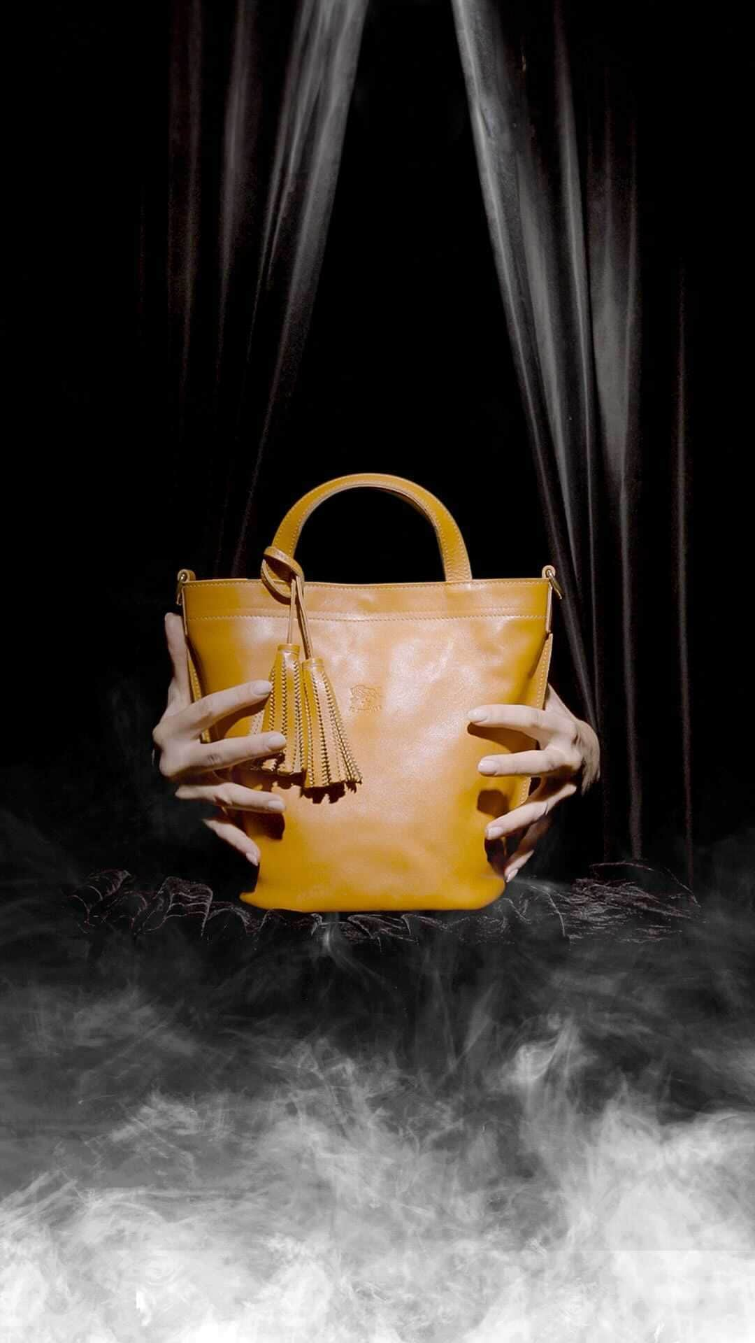 イルビゾンテのインスタグラム：「Trick or treat, but make it fashion! Entering the Halloween spirit with this enchanting leather bag admist a hauntingly stylish backdrop.   #ilbisonte #sustainability #madeinitaly」