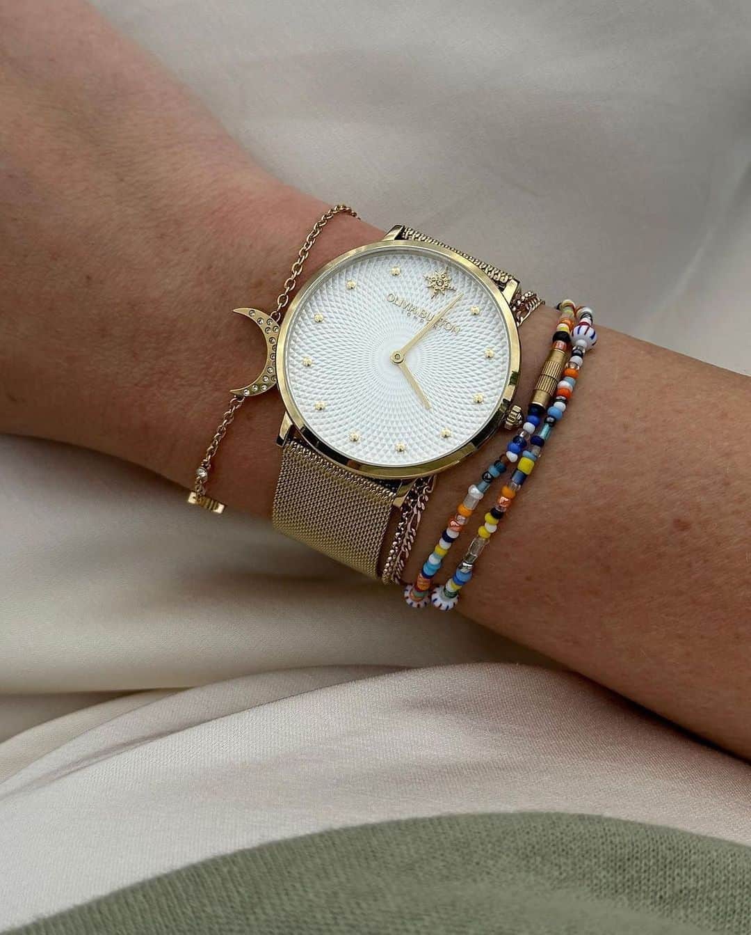 Olivia Burtonのインスタグラム：「We’re obsessed with our Ultra Slim Metallic Watch and our North Star & Moon Bracelet pairing ✨  📸 Credits: @hayley.b.daines   Tap to shop or head to our Covent Garden store.  #OliviaBurtonLondon #WomensWatches #Jewellery」