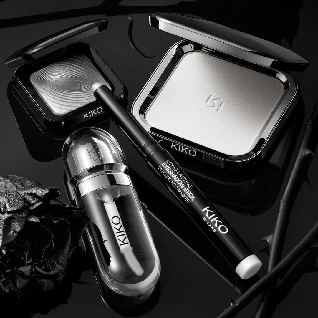 KIKO MILANOのインスタグラム：「What’s your go-to Halloween look? 🖤 Unleash your inner creativity and get ready to make heads turn and hearts race with these #KIKOMilano treats 🦇 ⁣ ⁣ Universal Veil Translucent Finishing Powder - Long Lasting Eyeshadow Stick 01 - New Water Eyeshadow 01 - 3D Hydra Lipgloss 01⁣」