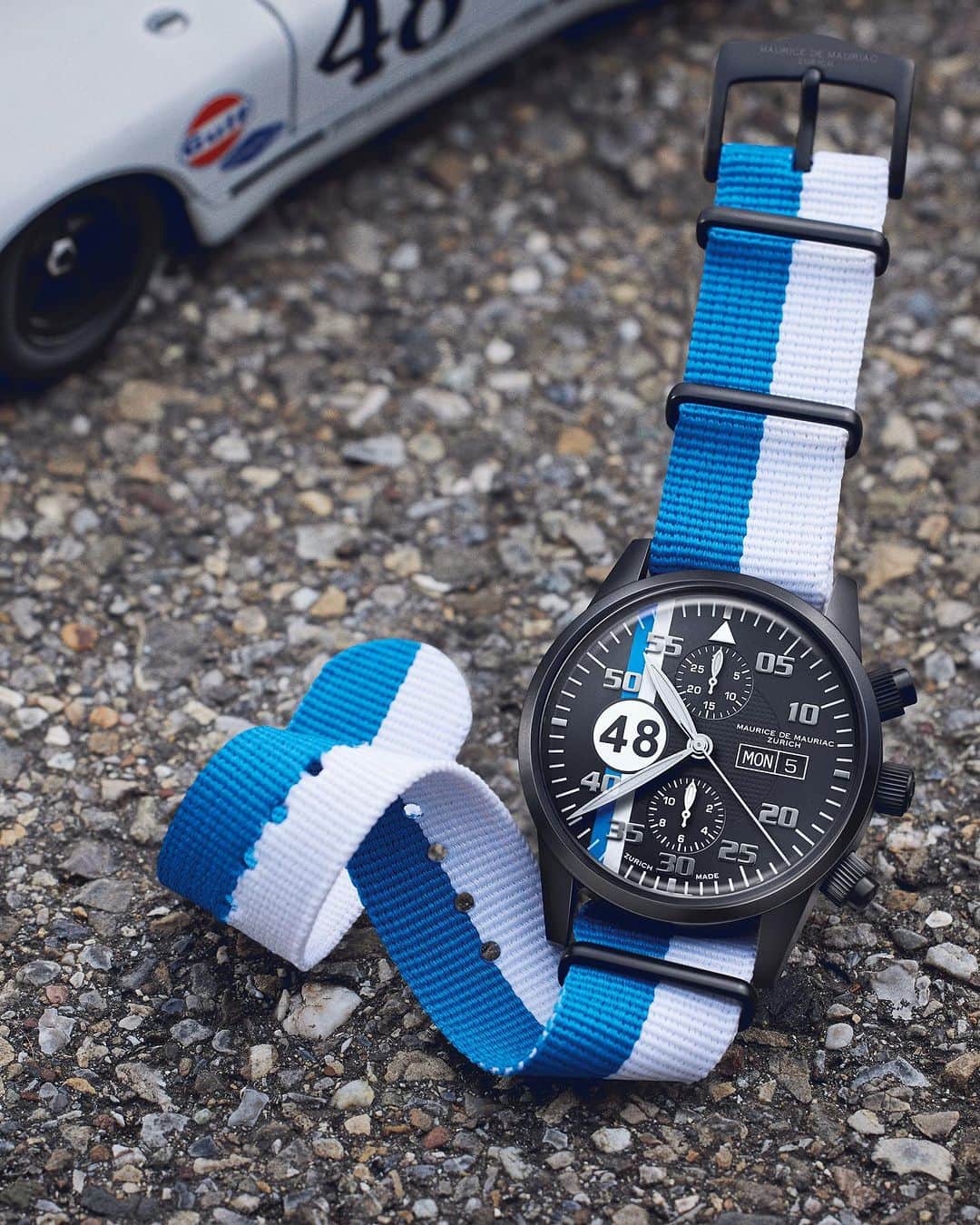 Maurice De Mauriac Zurichのインスタグラム：「Drive along with the new Grand Prix Zurich 🏁💙🤍  We celebrates motor-racing iconography with our hometown colors - the new customizable Chrono Modern Grand Prix Zurich. This new watch embodies the principles of timeless design and superior performance. The Chrono Modern Grand Prix Zurich is destined to become a must-have accessory for watch enthusiasts.  #MauriceDeMauriac #MDM #GrandPrixZurich #GP #GPZurich #GrandPrix #Racing #zurich #drivethrough #city #race #cars」