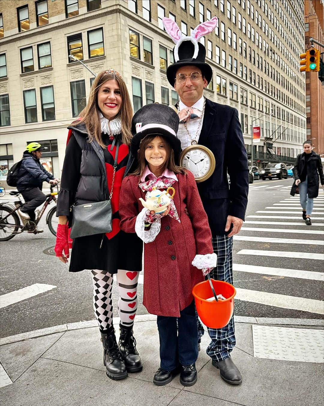 Ilana Wilesのインスタグラム：「Harlow wanted to be the Mad Hatter so like usual, Mike and I built our costumes around that. I was the Queen of Hearts and Mike was the white rabbit. Harlow made her hat herself by hot gluing a tea set to the top and cards on the side. I reinforced the inside with cardboard so it could hold the weight without buckling. There is no photo that does it justice. Mike was in charge of his own costume. He always acts like he’s not on top of it and then surprises us by knocking it out of the park at the last second. I wish I didn’t have my jacket on in the first photo but it was cold! If you’re wondering about Mazzy, she was a ghostbuster with a bunch of friends at a party on Saturday and spent tonight watching scary movies with a friend at home and answering the door for trick or treaters in our building. We missed her though!!!」