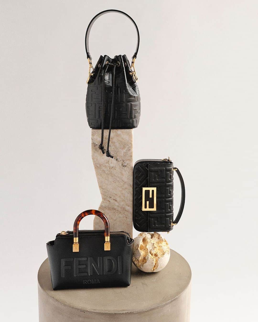 Fendiのインスタグラム：「Charming compact interpretations of the Maison's signature bags for extra on-the-go ease.  Artistic Director of Couture and Womenswear: @mrkimjones  Artistic Director of Accessories and Menswear: @silviaventurinifendi  Artistic Director of Jewellery: @delfinadelettrez  Styling: @nilonilo_ Grooming: #ShingoShibata  Casting: @shelleydurkancasting  Photography: @ellenfedors_  Set: @mattjacksonmattjackson」