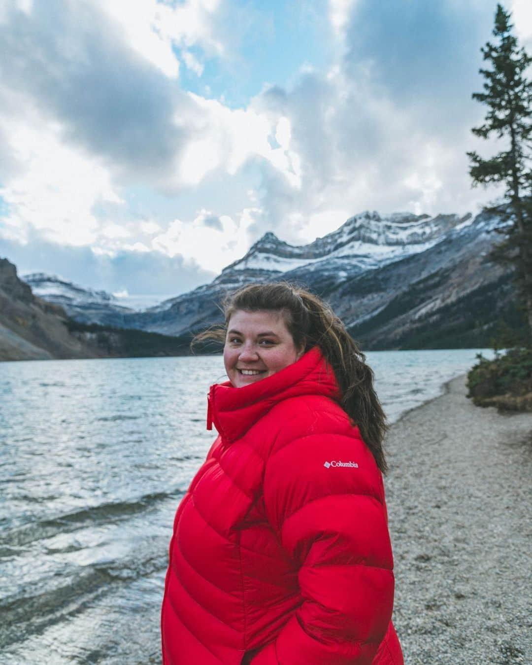 Explore Canadaさんのインスタグラム写真 - (Explore CanadaInstagram)「Introducing the Creators Network! We’ve brought together creatives from across the country to showcase what we love most about where we live.   Meet the first five creators!  📷 Photo 1-2: Ken @kenny_hagen, British Columbia 📷 Photo 3-4: Kimberley @westcoastlife, British Columbia 📷 Photo 5-6: Dave @davey_gravy, Alberta 📷 Photo 7-8: Kaila @kailawalton, Alberta 📷 Photo 9-10: Herry @herry.with.an.e, Saskatchewan  #ExploreCanadaCreator #ExploreCanada  Image description:  Photo 1) Person in a bright yellow jacket smiles at the camera. In the distance, there are green and yellow trees to one side and a snowy mountain to the other. Photo 2) A wide shot of two people climbing a mountain. In the background, grey mountains and green trees surround a blue water. Photo 3) Person in black jacket looks off to the side. In the back, light shines from above, illuminating trees and logs.  Photo 4) Two whales peek out of deep blue water. In the background, a small cabin and ramp to the water is surrounded by green trees. Photo 5) Person standing in front of a black and white backdrop smiles with arms crossed. Photo 6) Wide shot of a brown mountain range topped with green grass. Person walks along a path in the distance. Photo 7) Person stands on a beach in a red jacket. In the distance, there’s a body of water, a tree and snow capped mountains. Photo 8) A log cabin is surrounded by green trees. The sky is covered with purple, yellow and pink clouds. Photo 9) Person in a yellow jacket stands on a flat rock surrounded by water. Mountains sparsely covered with snow, lined with yellow and green trees are seen in the distance. Photo 10) A brown field and star-filled sky fill the frame. A big barn and two smaller barns along with two trees are in the distance.」11月2日 1時30分 - explorecanada