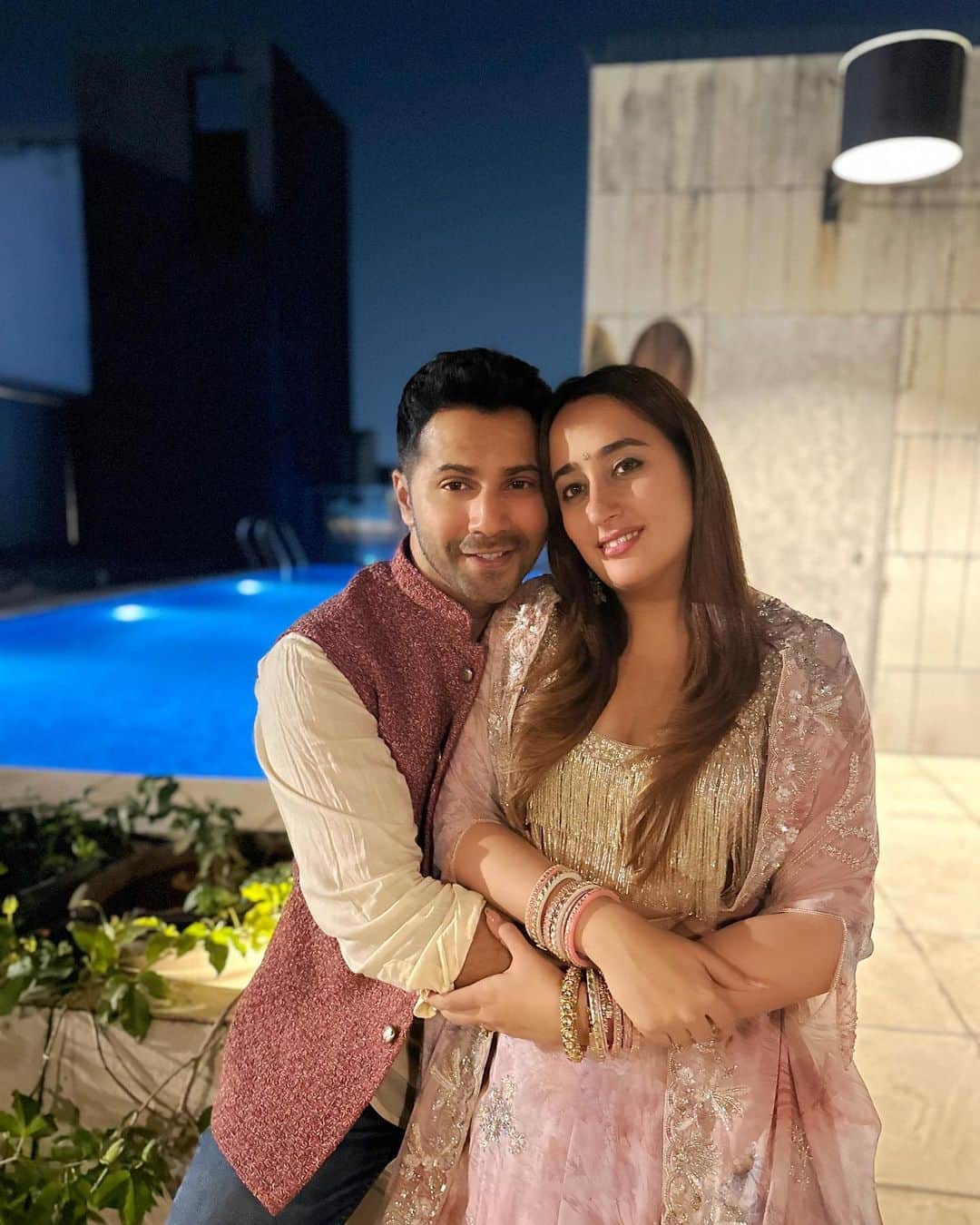 Varun Dhawanのインスタグラム：「Happy karvachauth to everyone out there celebrating. Wishing safety and peace to all. Bharatya naari sab be bhaari though natasha is really light so love making her sit on my lap」