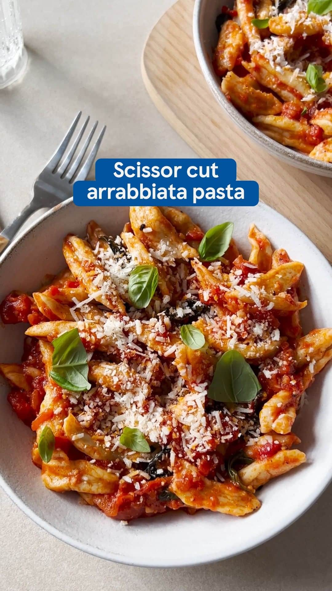 Tesco Food Officialのインスタグラム：「This scissor cut pasta is a cut above the rest ✂️ Simply make a classic pasta dough and snip it straight into boiling water. Why not serve it with a spicy arrabbiata sauce? Find the recipe below.   Serves 2  V* Takes 50 mins   For the pasta 200g Tesco Finest 00 flour 2 eggs, lightly beaten   For the arrabbiata sauce 2 tbsp olive oil 4 large garlic cloves, finely chopped 1-2 small red chillies, deseeded and finely chopped 400g tin Italian finely chopped tomatoes 20g basil, leaves picked 25g Parmesan or vegetarian hard cheese, finely grated  1. Tip the flour into a large bowl and make a well in the centre. Pour the eggs into the well and mix with a wooden spoon until you have a shaggy dough. Tip onto a clean work surface and knead for 10 mins until you have a smooth, uniform ball. Put back in the bowl, cover with a clean tea towel and leave to rest for 20 mins. 2. Meanwhile, warm the oil in a frying pan over a medium heat. Add the garlic and chilli (see tip) and fry for 2-3 mins until the garlic starts to sizzle and soften. Add the tomatoes, bring to the boil, then simmer for 15 mins, stirring occasionally. Remove from the heat and stir through the basil, saving a few leaves to garnish, and season with black pepper and a small pinch of caster sugar. 3. Bring a large saucepan of water to the boil. Using a pair of scissors, cut small chunks of pasta dough directly into the boiling water. Once the last chunk has been added, cook for 7-8 mins until al dente. Drain through a colander, saving a mug of cooking water, then add to the pan with the sauce. Add a splash of the cooking water if needed to loosen, then toss until well combined. 4. Divide between 2 bowls and top with grated cheese, the reserved basil leaves and a generous grinding of black pepper.  *If using vegetarian hard cheese.」